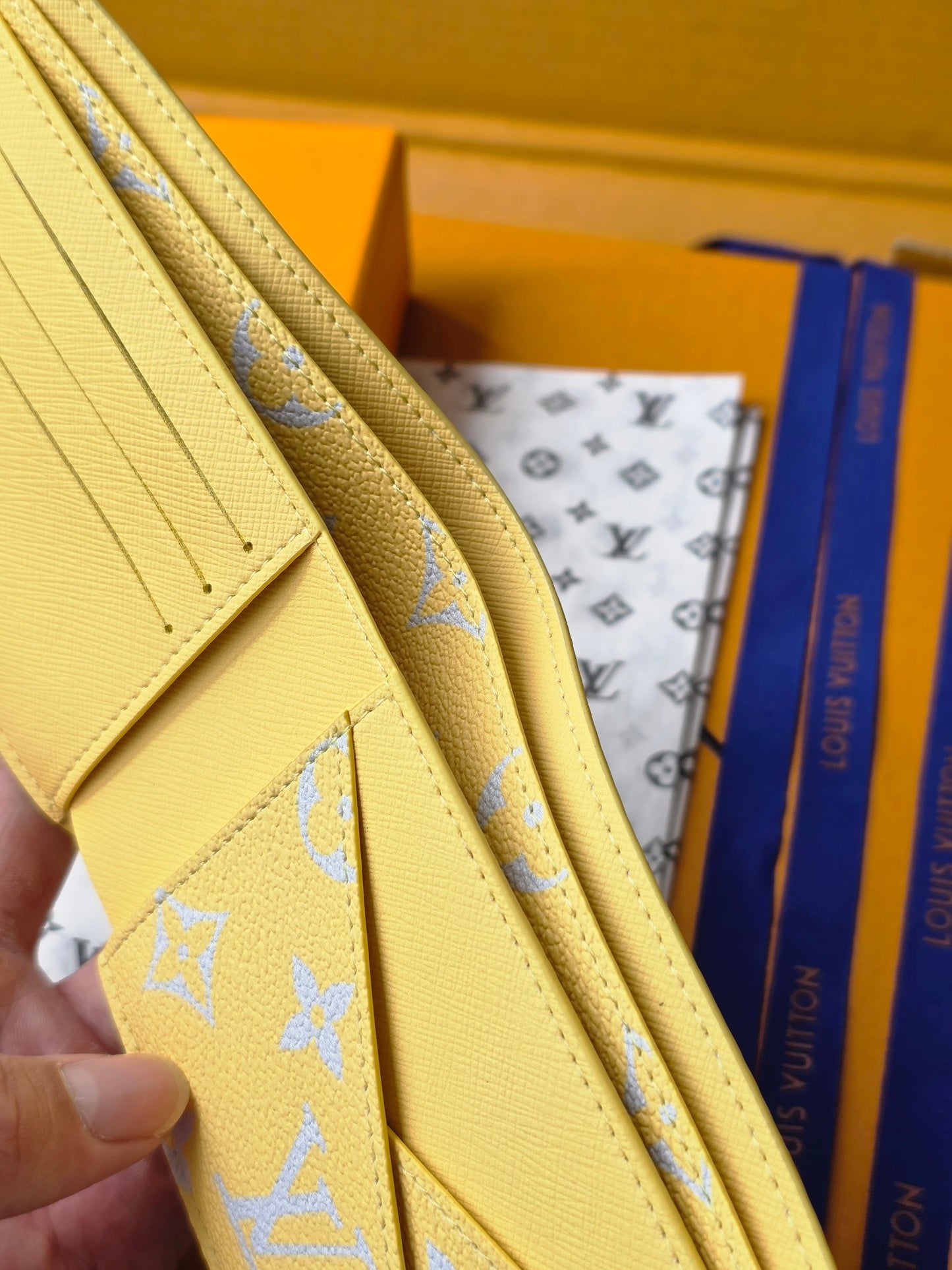 Elegant Louis Vuitton Light Blue Wallet With Gold Monogram And Sparkling Accents M14694