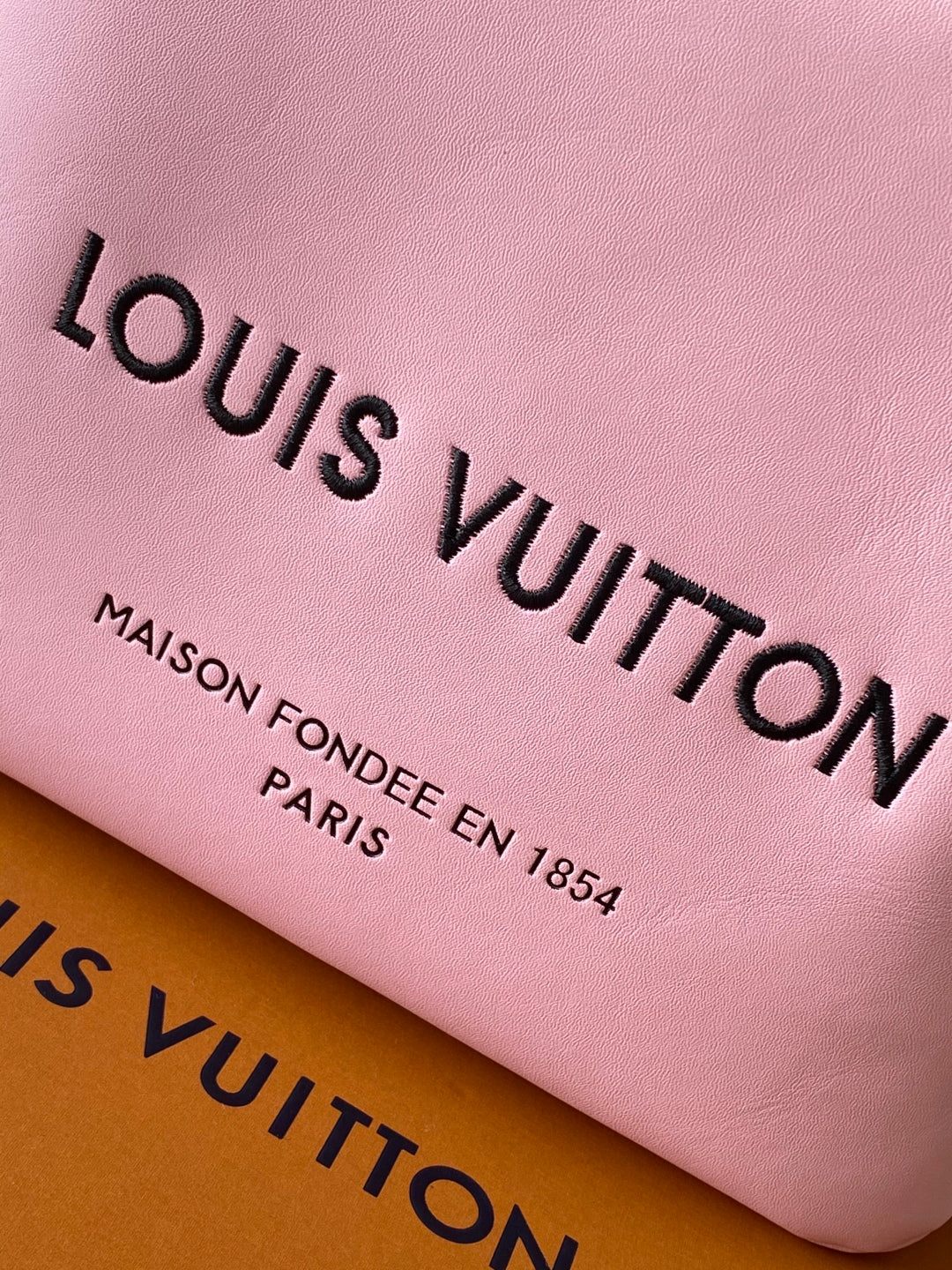 Elegant Pink Louis Vuitton Tote Bag With Contrast Color Handles And Branding