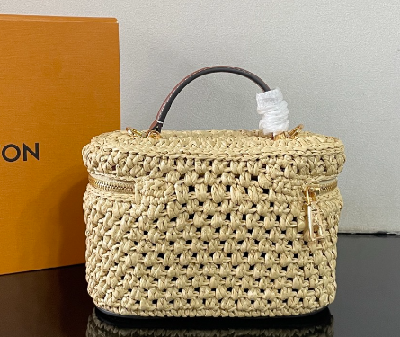 Chic Louis Vuitton Woven Straw Vanity Bag With Leather Handle And Lock Accents