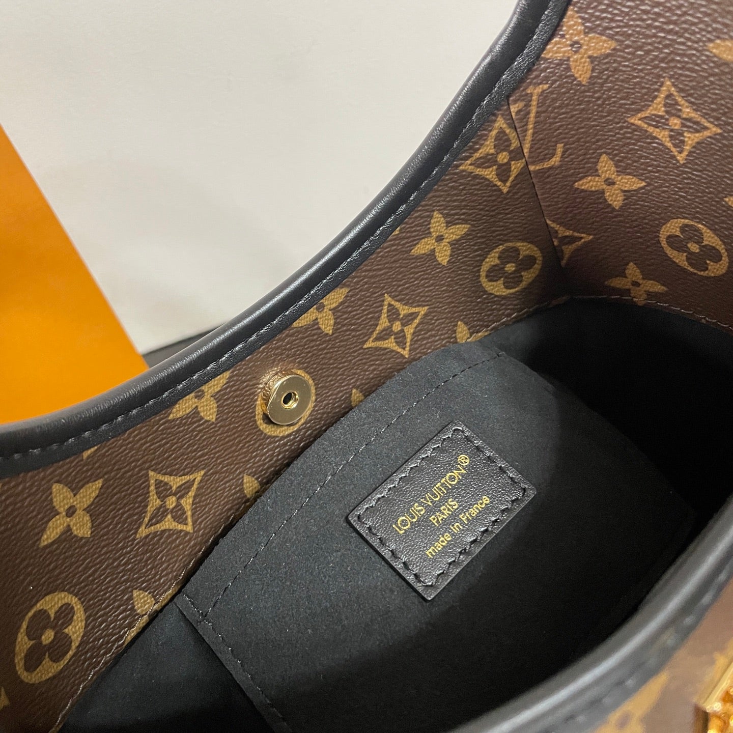 Louis Vuitton Monogram Canvas Hobo Bag With Lock Detail And Stylish Design For Fashion Fans