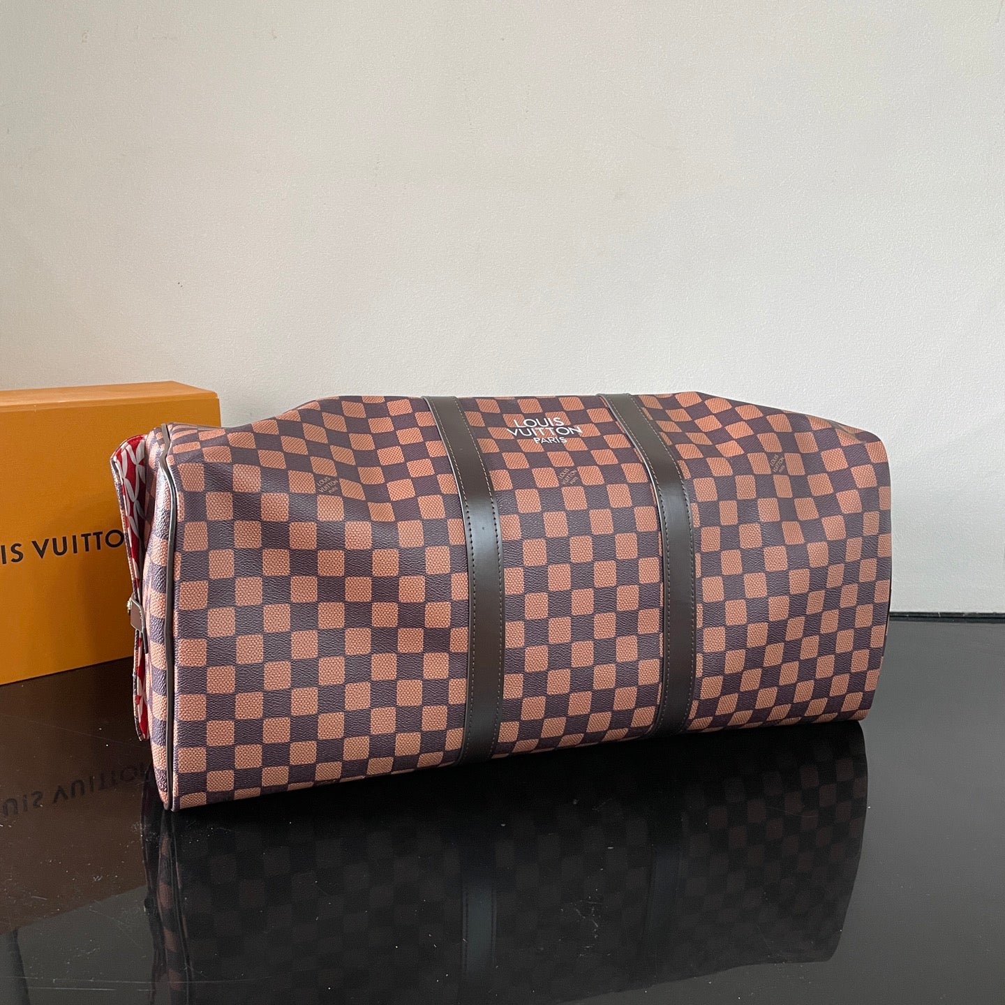Louis Vuitton Damier Pattern Travel Bag With Unique Graphic Design For Fashion Trips