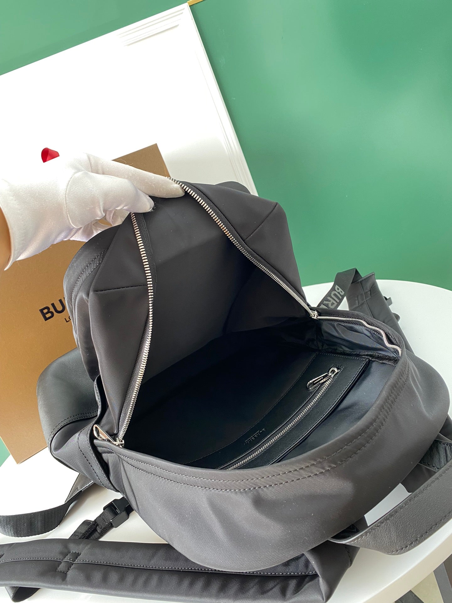 Sleek Black Burberry Backpack With Durable Nylon Material And Signature Branding Style No.3316