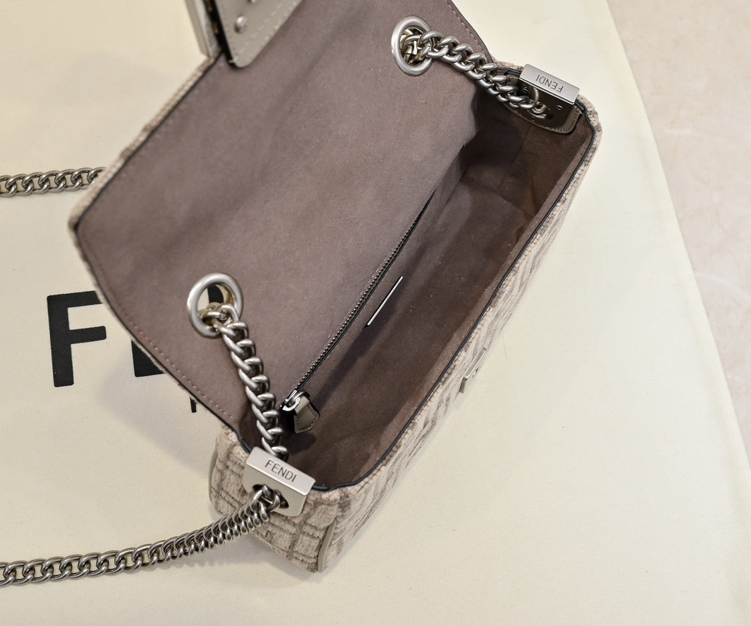 Elegant Fendi Baguette Bag With Signature FF Pattern And Chain Strap 008