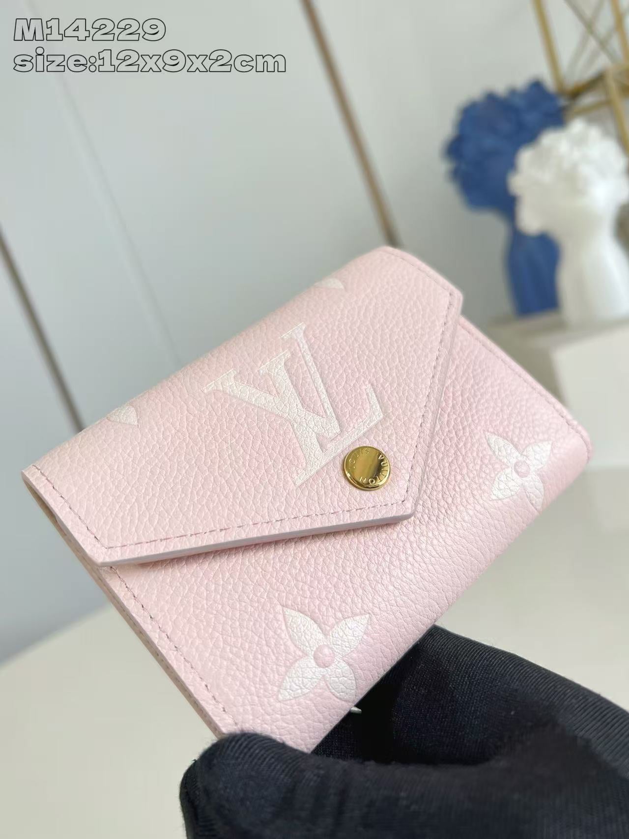 Chic Louis Vuitton Pink Leather Wallet With Embossed Monogram And Gold Accent M14229