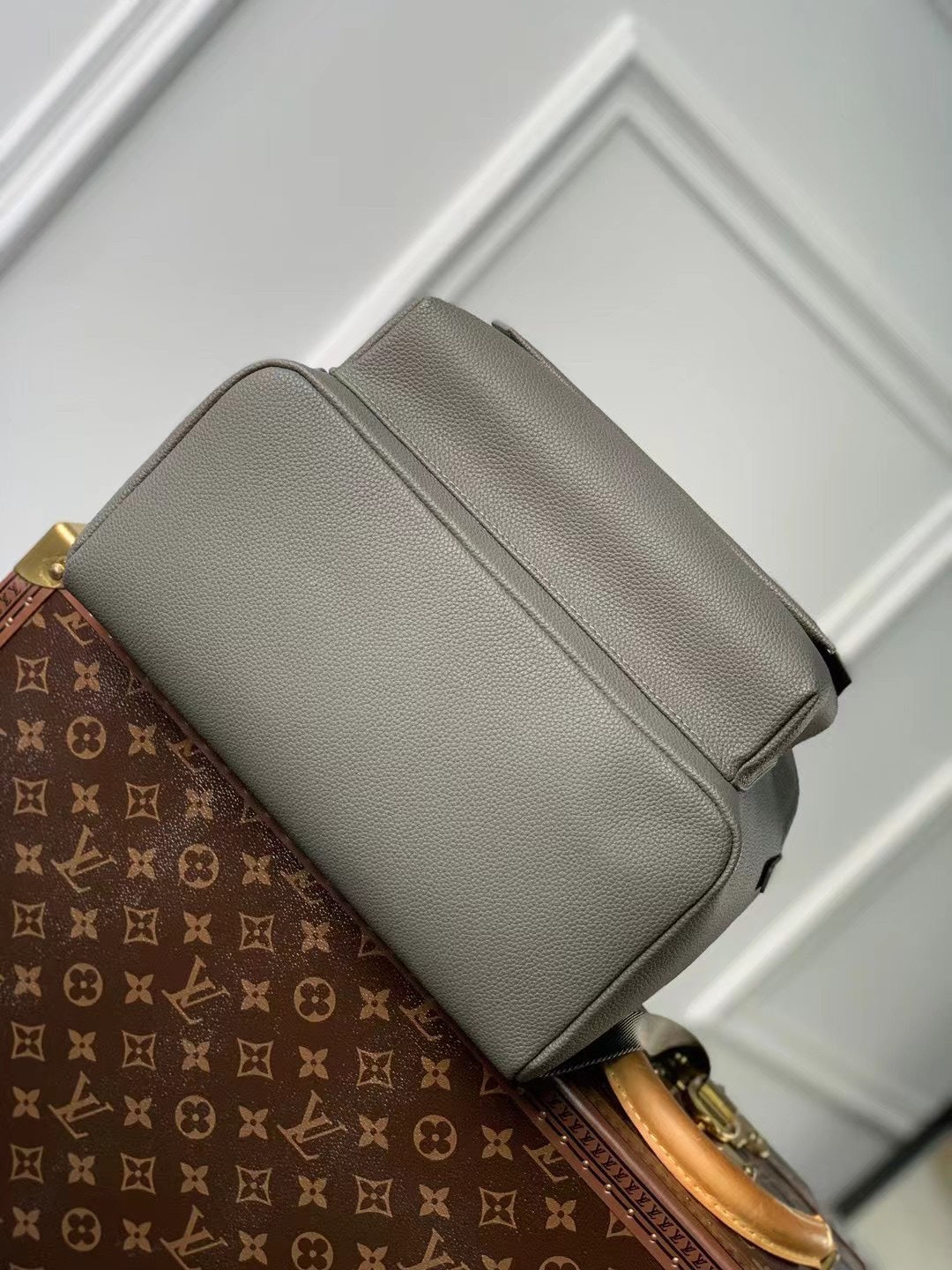 Sleek Gray Louis Vuitton Backpack Crafted From Premium Leather For Modern Style
