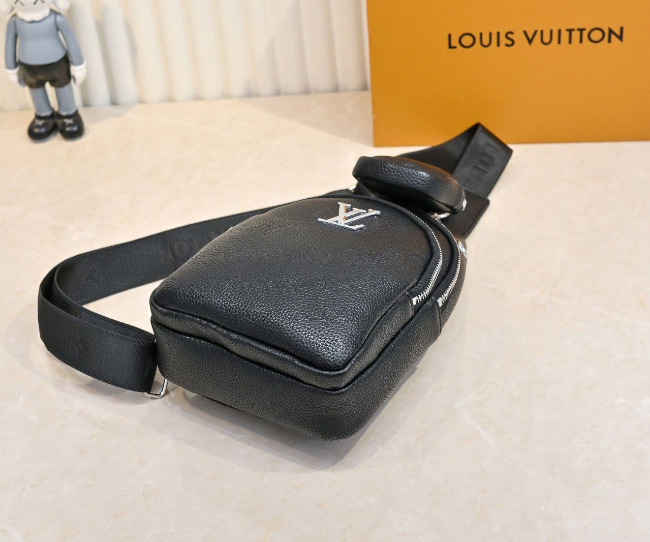 Luxury Louis Vuitton Black Leather Sling Bag with Signature Logo and Stylish Design