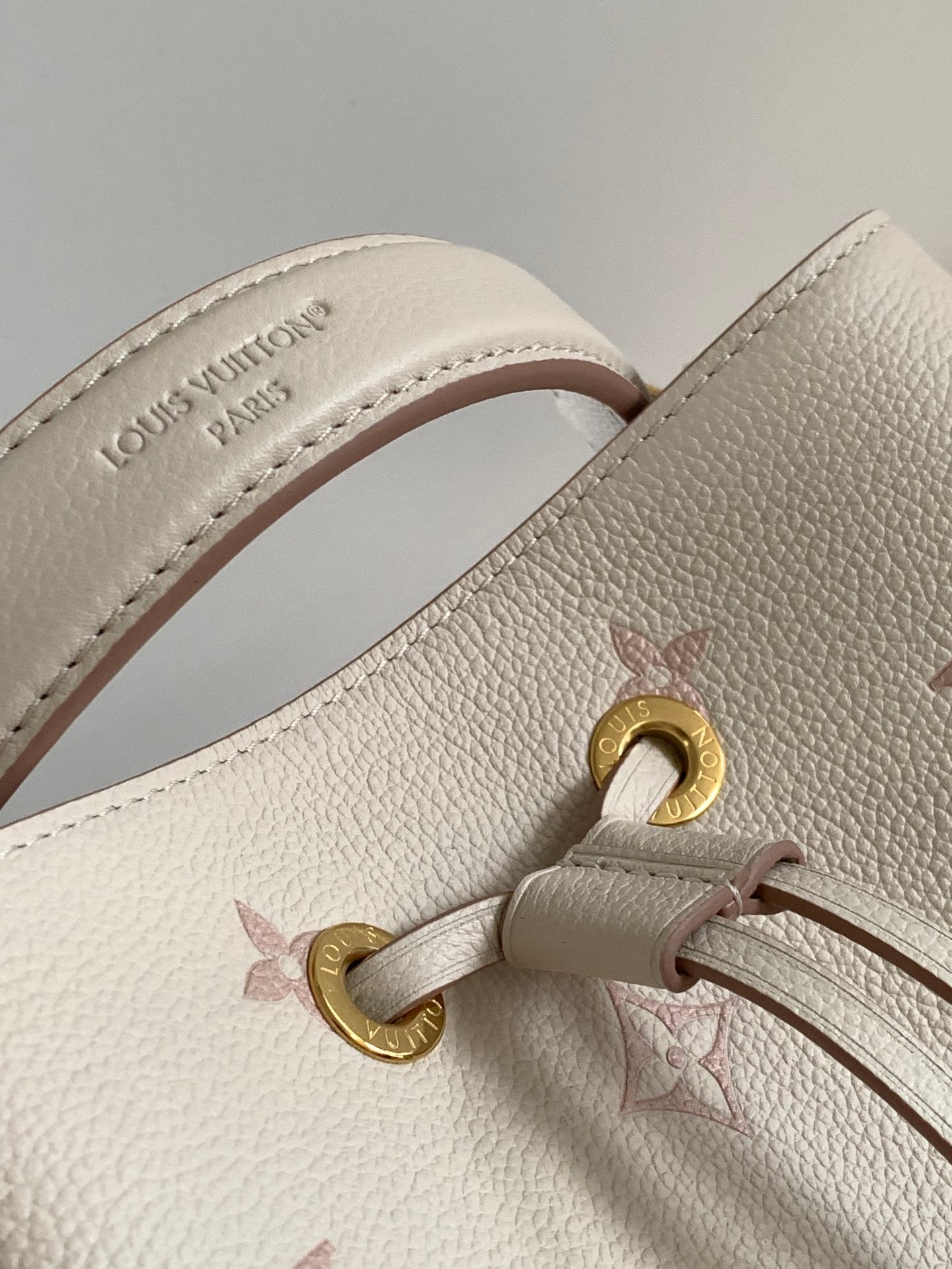 Chic Louis Vuitton White Monogram Empreinte Bucket Bag for Fashion - Forward Style