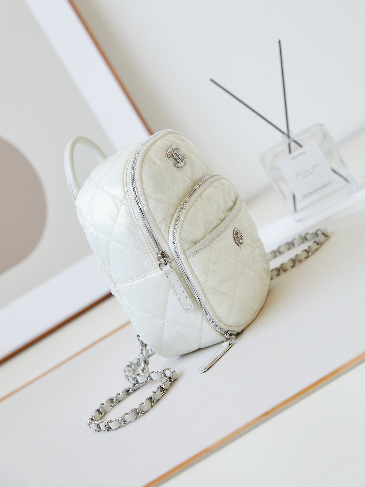 Chanel Mini Backpack White Quilted Nylon with Silver - Tone Hardware and Chain Straps AS4366