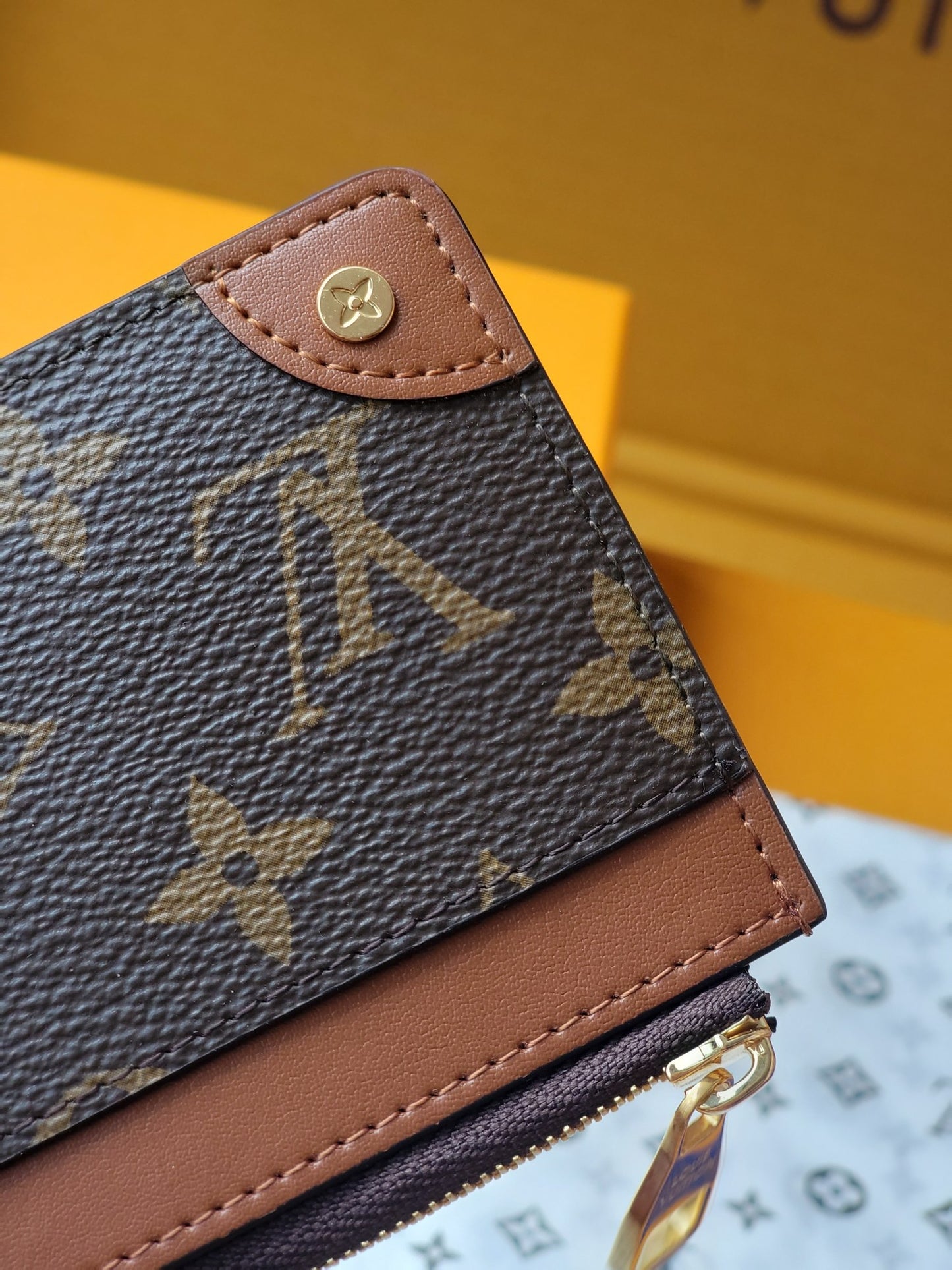 Chic Louis Vuitton Monogram Card Holder With Brown Accents And Gold Zipper M80556