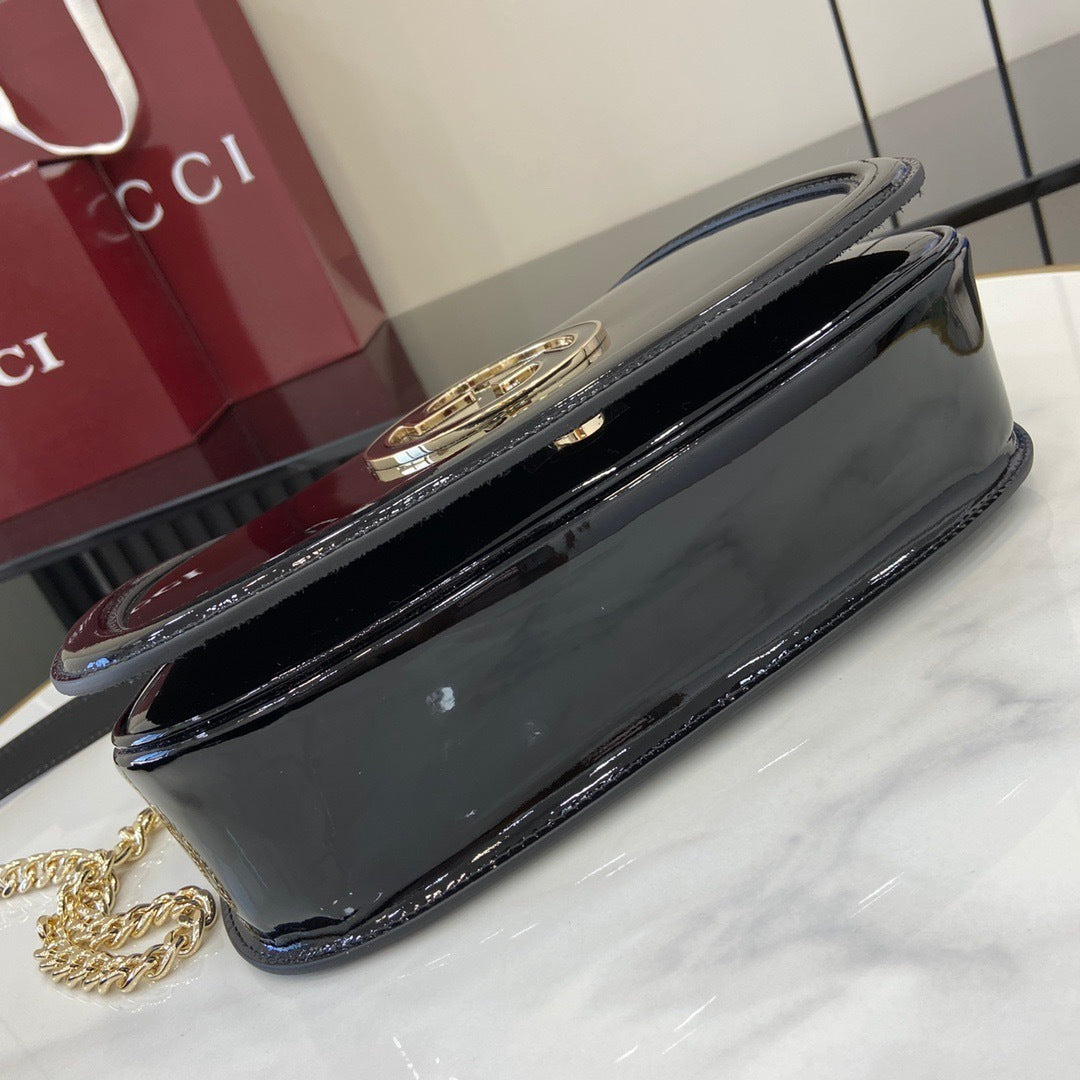 Gucci Black Patent Leather Shoulder Bag With Gold Tone Interlocking G Logo And Chain Strap 815715