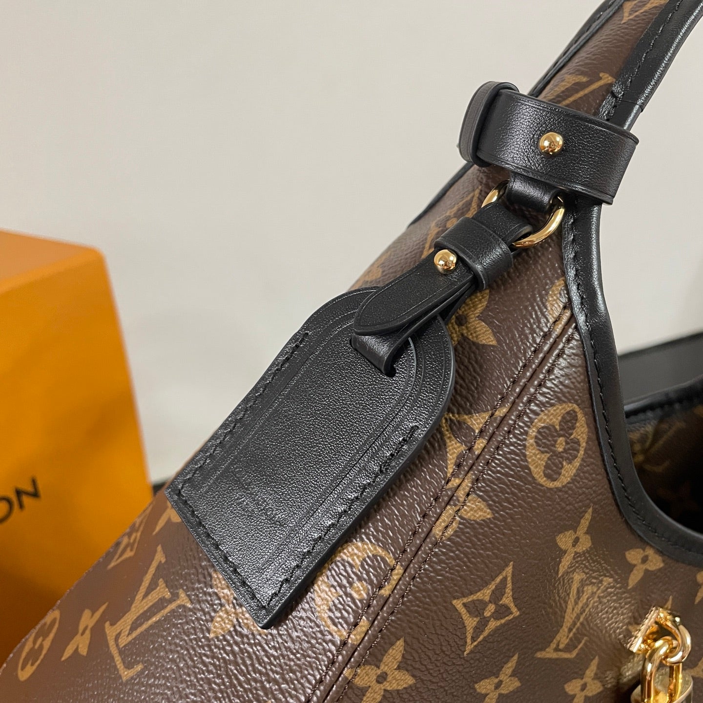 Louis Vuitton Monogram Canvas Hobo Bag With Lock Detail And Stylish Design For Fashion Fans