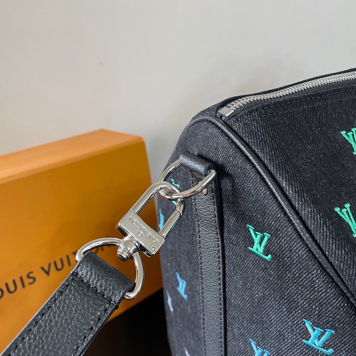 Luxury Black Travel Duffel Bag with Colorful LV Monogram for Stylish Weekend Getaways