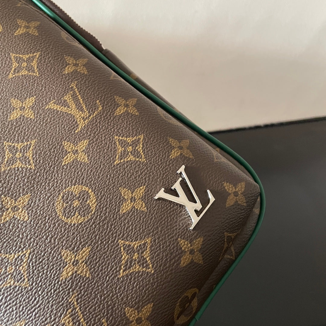 Stylish Louis Vuitton Monogram Canvas Sling Bag with Green Accents and Classic Design M12734