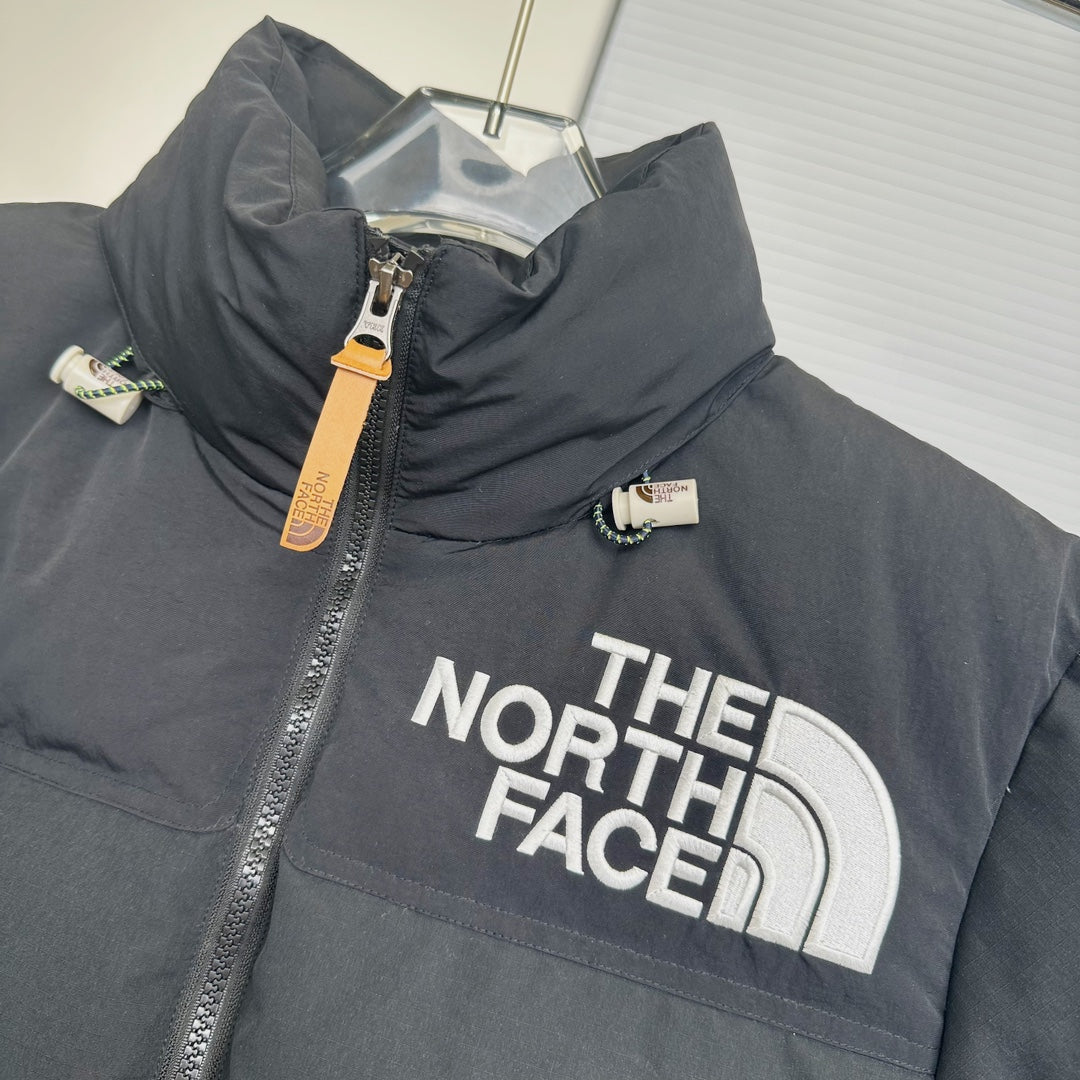 The North Face Black Nuptse Puffer Jacket With Iconic Branding And Warmth