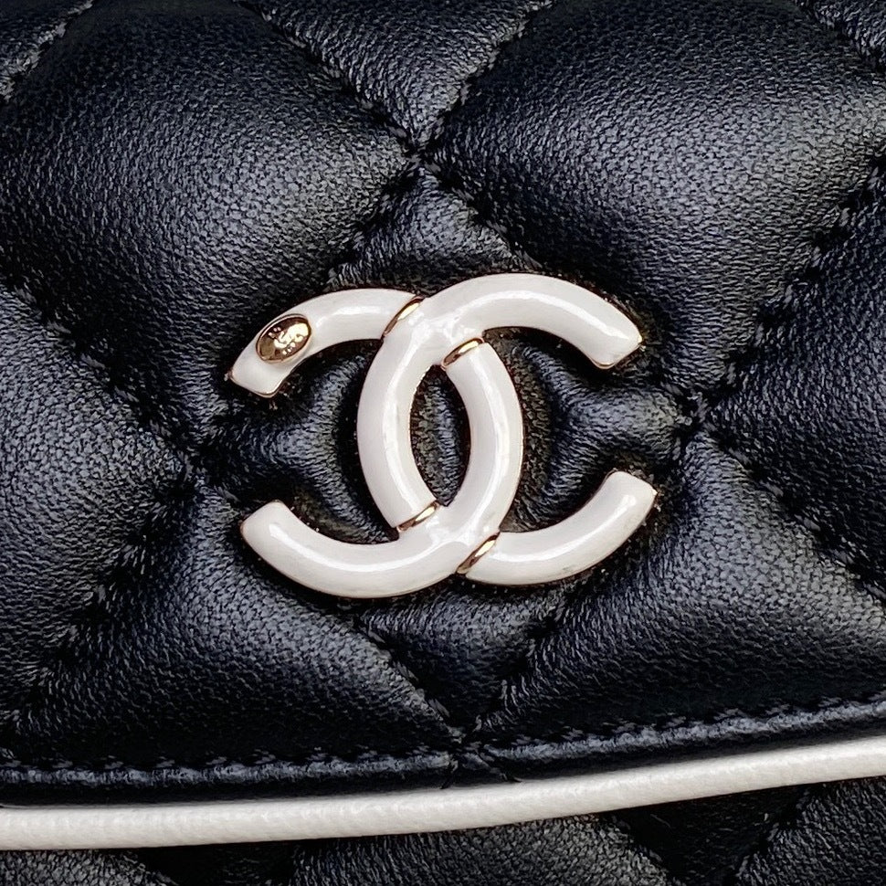Chanel Quilted Black Leather Mini Backpack with White Trim and Gold - Tone Chain Straps AP4514
