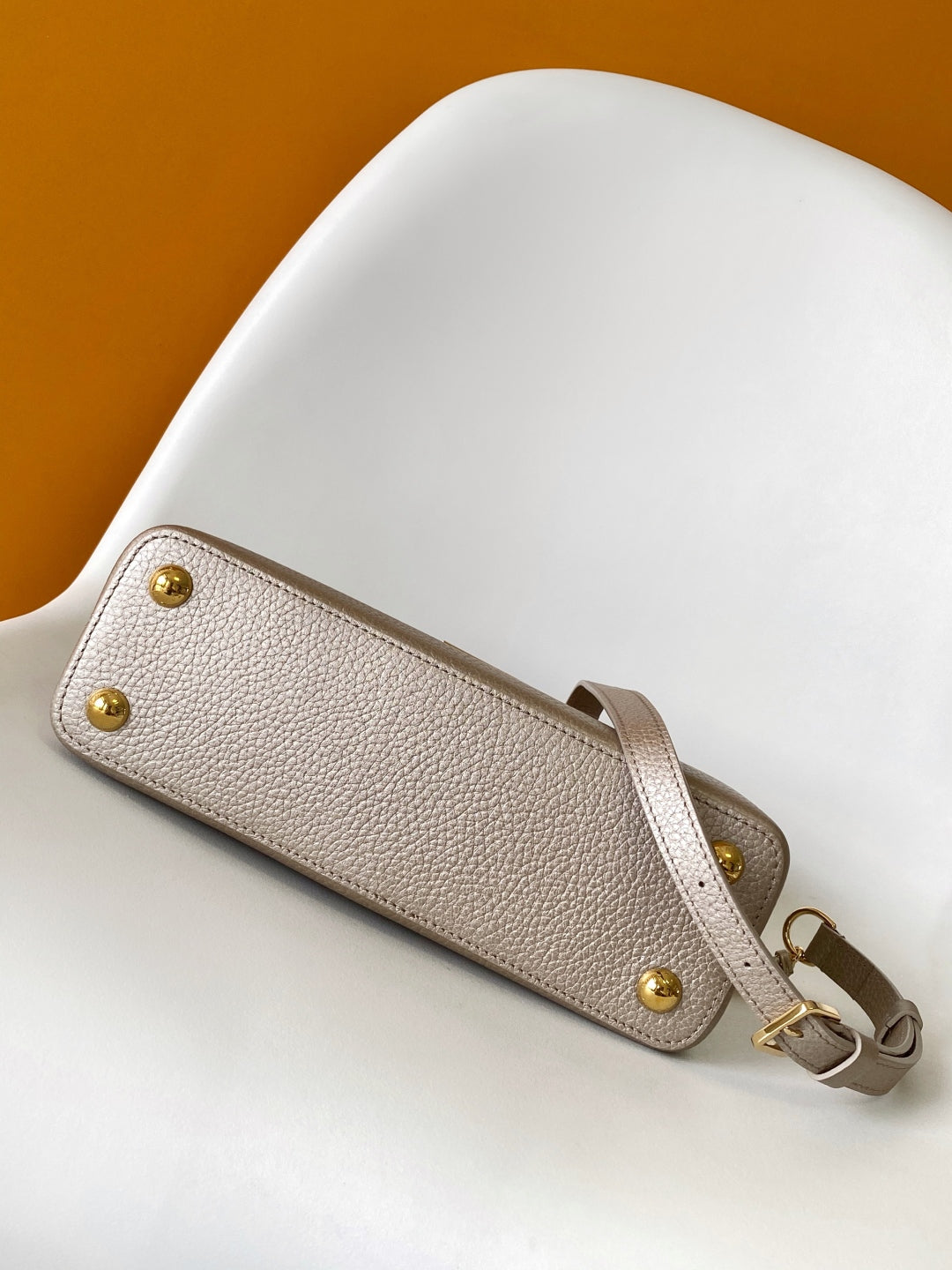 Elegant Louis Vuitton Capucines Mini Bag in Beige Grained Leather with Gold Accents