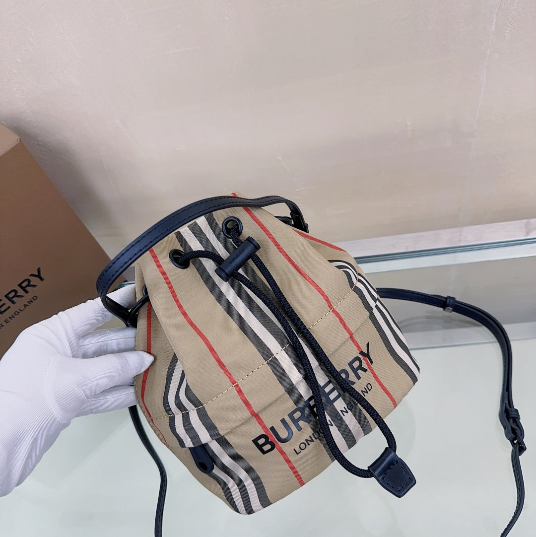 Classic Beige Burberry Striped Bucket Bag With Drawstring Closure And Leather Straps Style No.1151