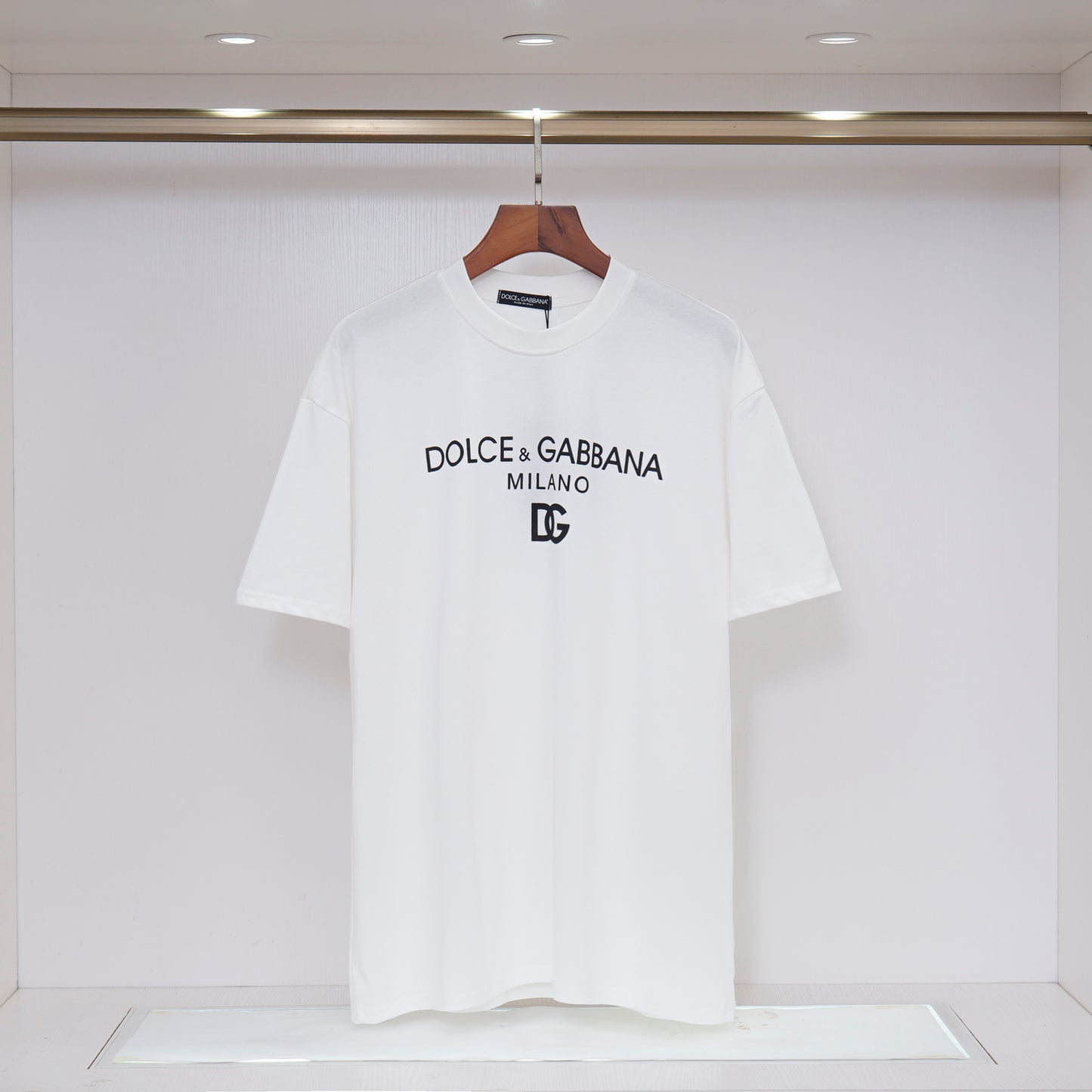 Sophisticated Dolce & Gabbana Black/White T - Shirt With Iconic Branding For Fashion Connoisseurs