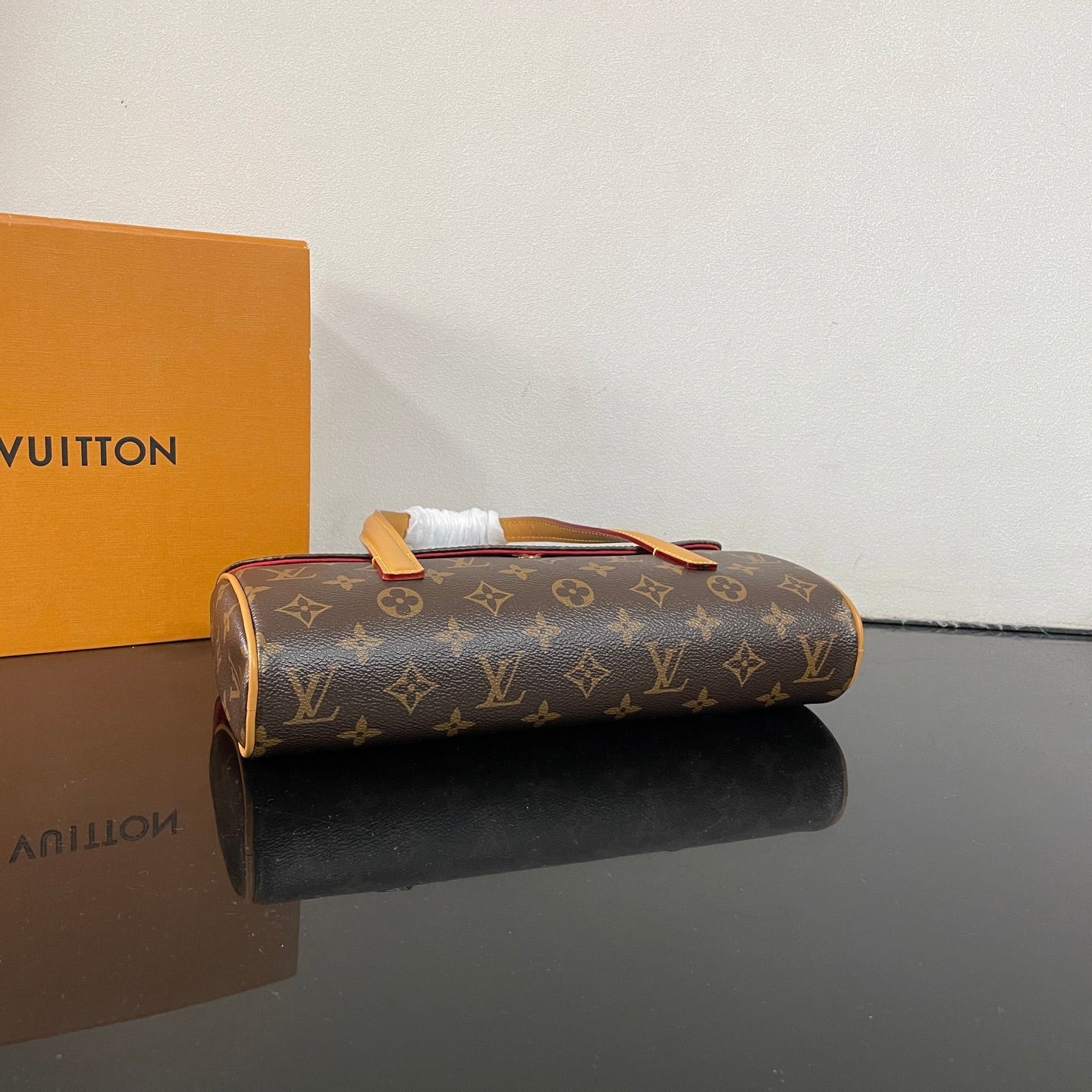 Classic Louis Vuitton Monogram Cylinder Handbag With Leather Handles And Timeless Design