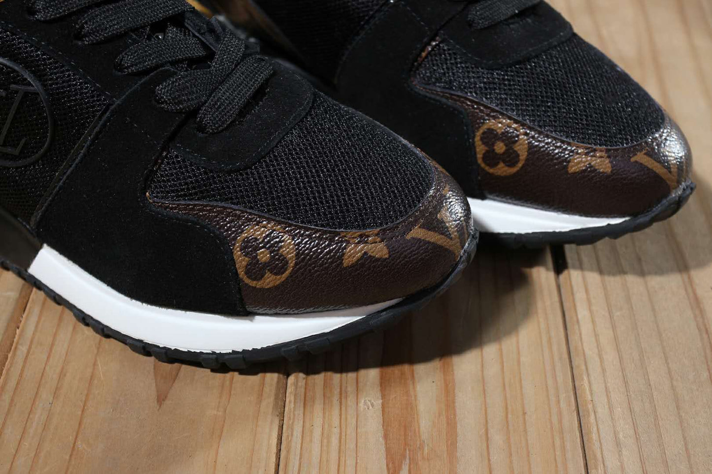 Louis Vuitton Women's Fashion Sneakers With Gold Accents And Signature Patterns