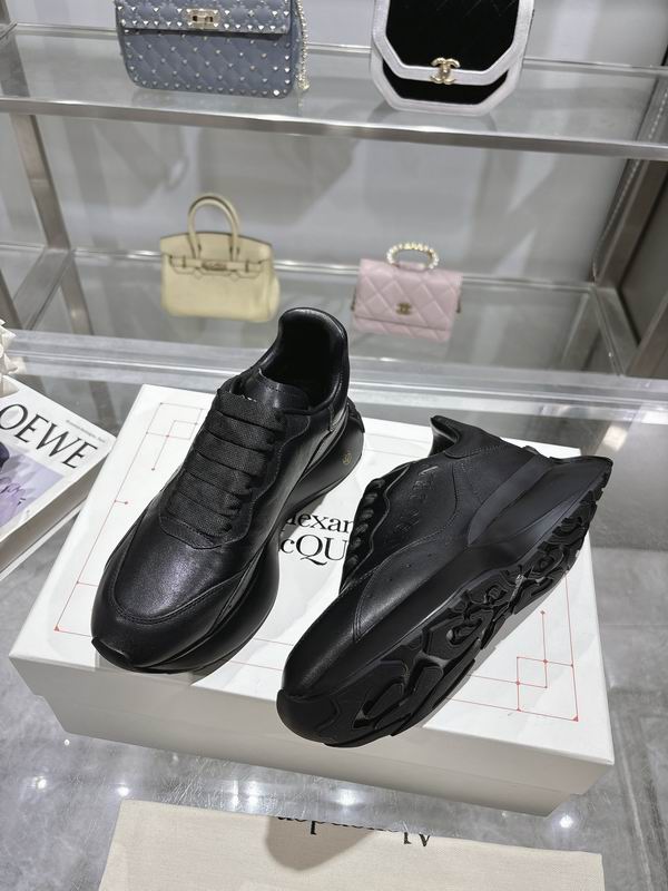 Sleek All Black Alexander McQueen Oversized Sneakers For Timeless Street Style