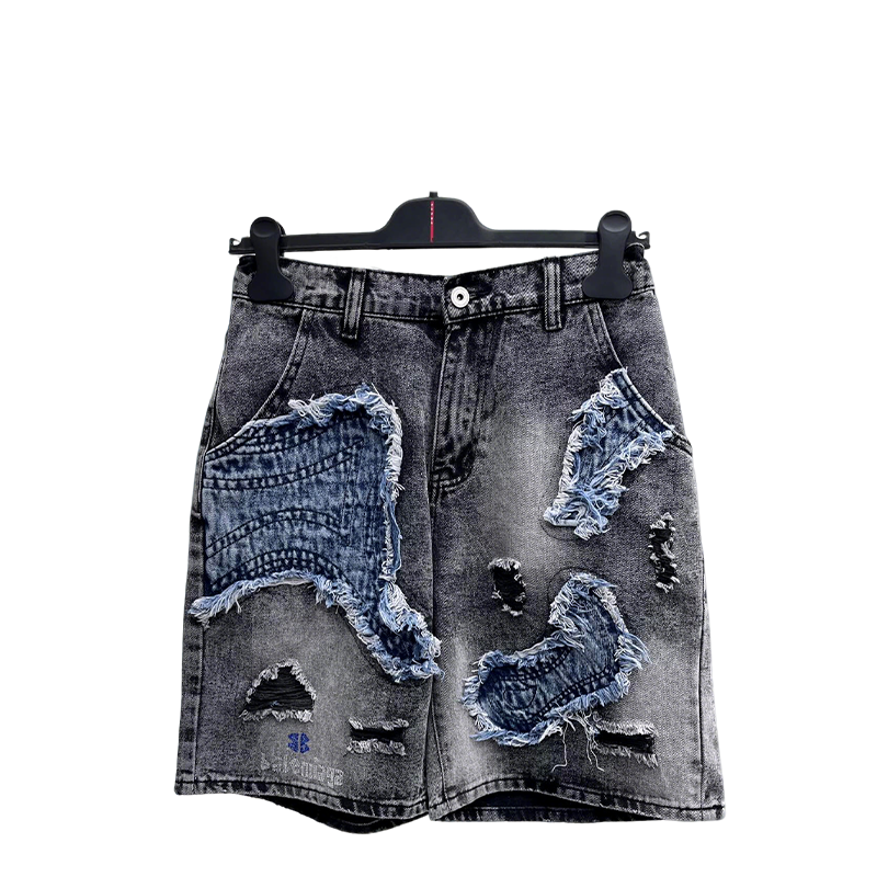 Balenciaga Distressed Patchwork Denim Shorts With Vintage Style