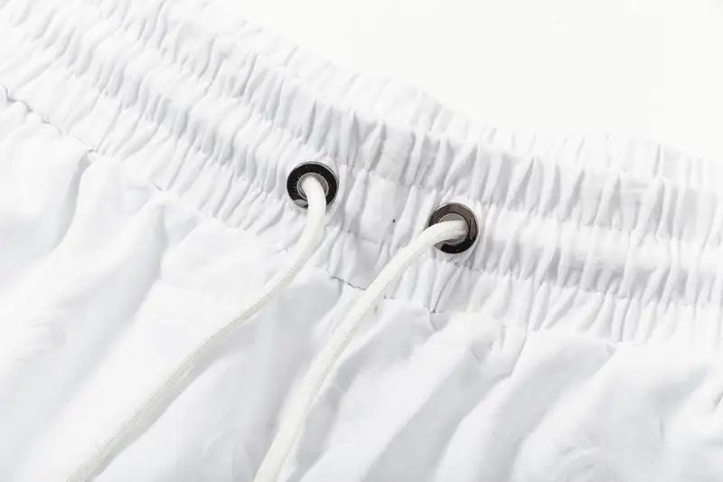 Dolce & Gabbana White Textured Shorts With Branded Patch
