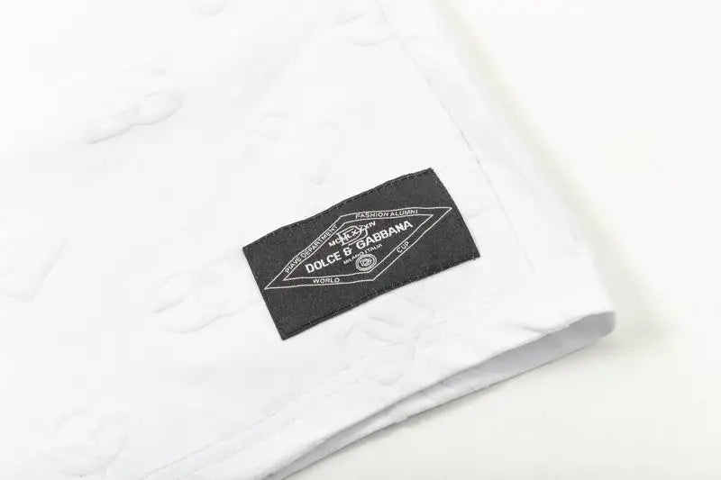 Dolce & Gabbana White Textured Shorts With Branded Patch