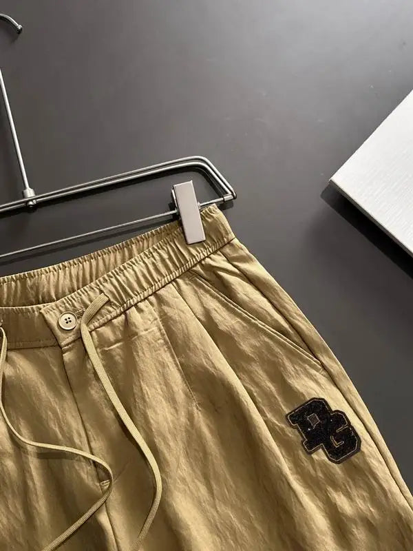 Dolce & Gabbana Beige Shorts With Brand Embroidered Patch