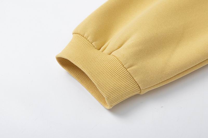 Fear Of God Black Hoodie With Gold Homecoming Lettering For Casual Chic Outfits