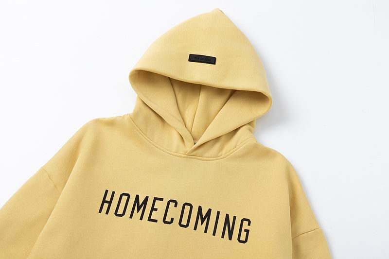 Fear Of God Black Hoodie With Gold Homecoming Lettering For Casual Chic Outfits