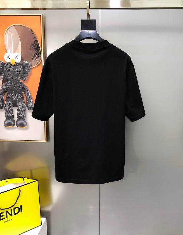 Stylish Fendi Black/White T - Shirt With Iconic Yellow Monster Eyes And Branding