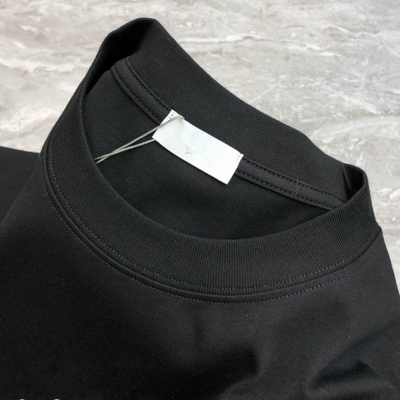 Stylish Fendi Black/White T - Shirt With Iconic Yellow Monster Eyes And Branding