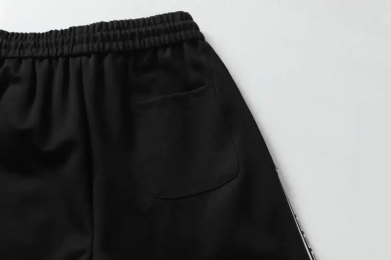 Givenchy Men's Black Shorts with Greek Key Pattern Details
