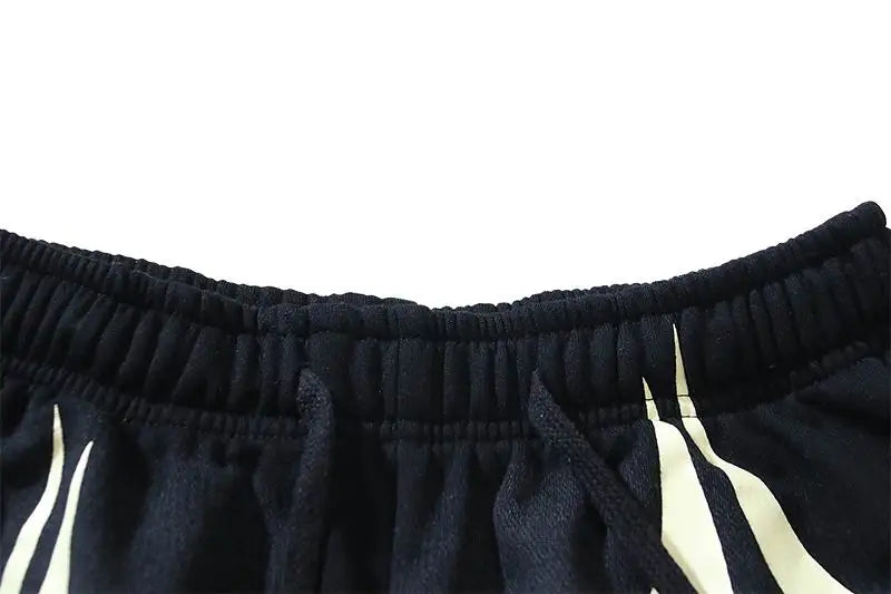 Hellstar Men's Black Drawstring Shorts with Cream Flame Graphics