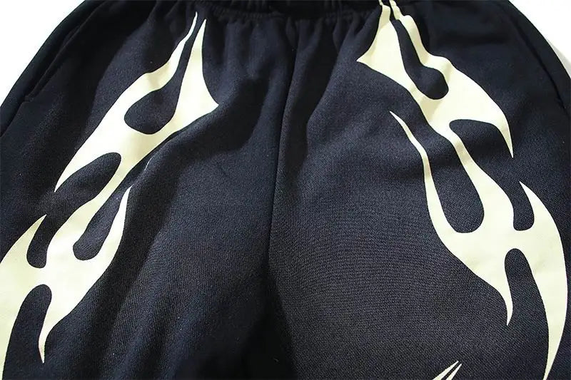Hellstar Men's Black Drawstring Shorts with Cream Flame Graphics