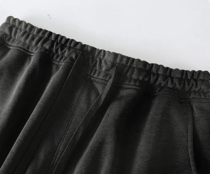 Hermès Men's Black Drawstring Shorts with Orange H Logo