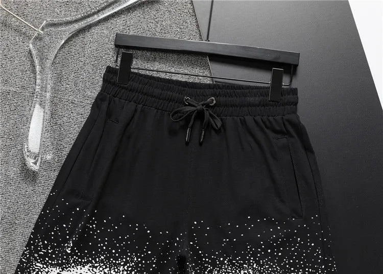 Louis Vuitton Men's Black Drawstring Shorts with White Spray Print