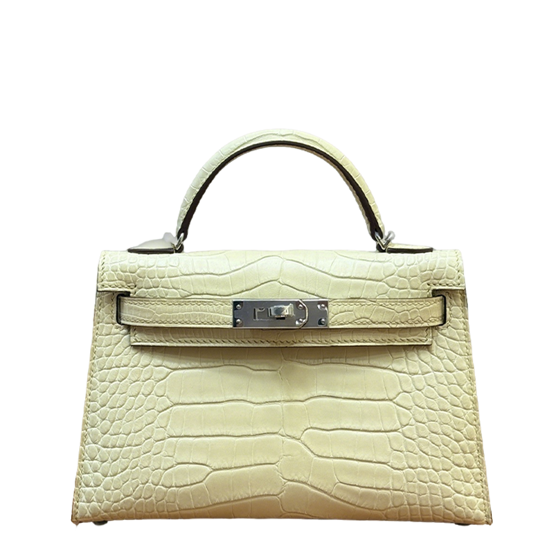 Elegant Hermès Kelly Bag in Cream Crocodile Leather with Strap 1920