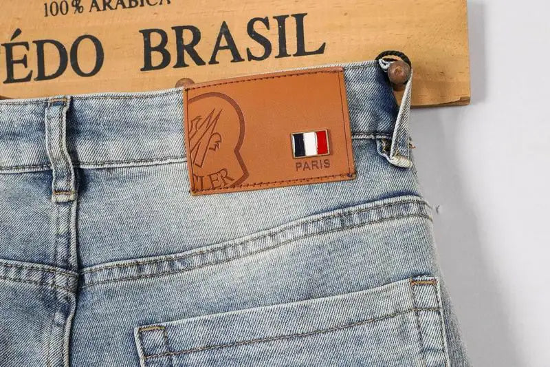 Moncler Men's Jeans in Light Shade with Distinctive Logo Embroidery