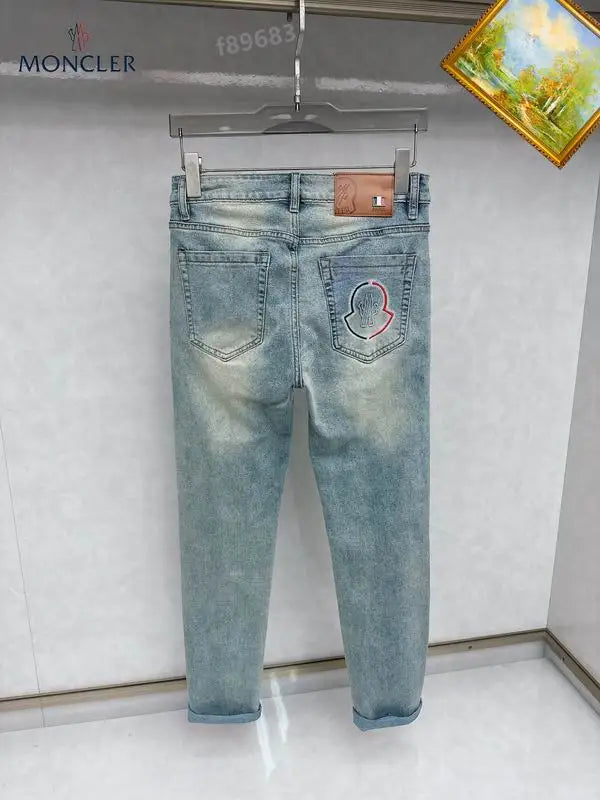 Moncler Men's Jeans with Light Wash and Unique Embroidered Detail