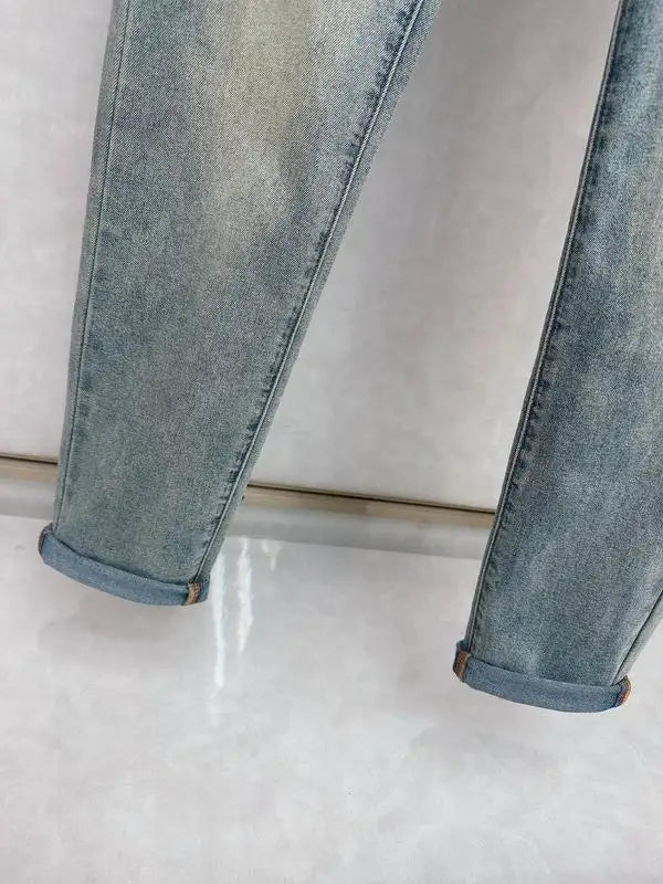 Moncler Men's Jeans with Light Wash and Unique Embroidered Detail