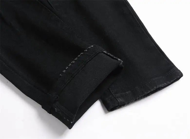 Philipp Plein Men's Black Jeans With Skull Graphic And Edgy Detailing