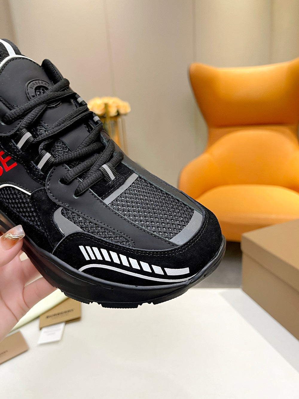 Burberry Black Sneakers With Red Accents For Trendy Looks
