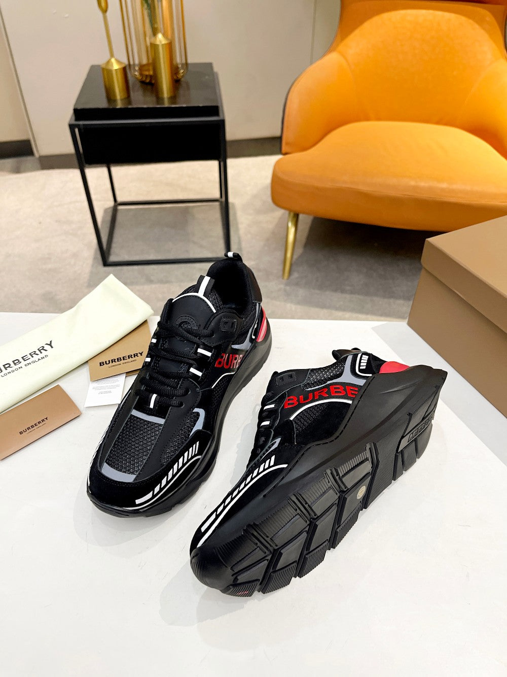 Burberry Black Sneakers With Red Accents For Trendy Looks