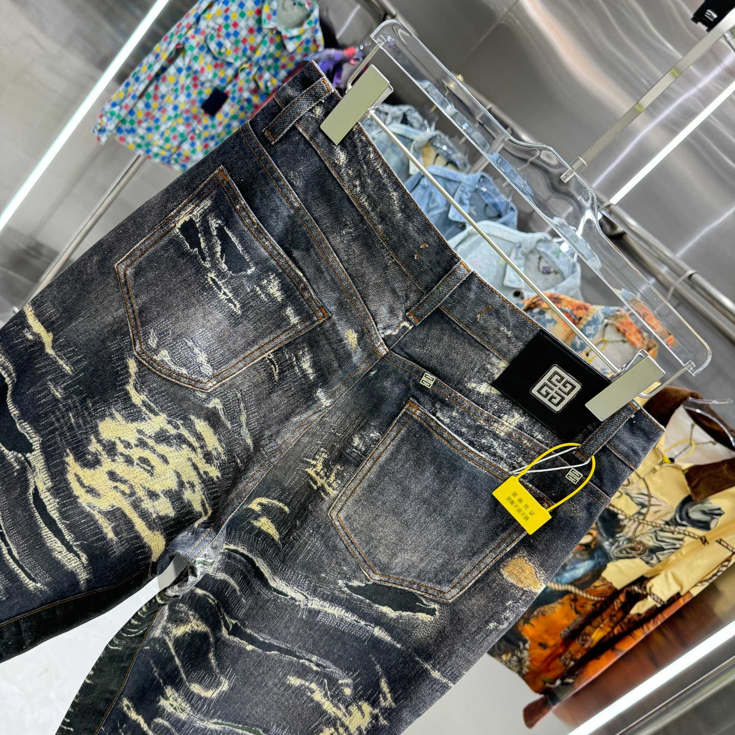 Givenchy Distressed Denim Jeans With Unique Patchwork For Edgy Fashion