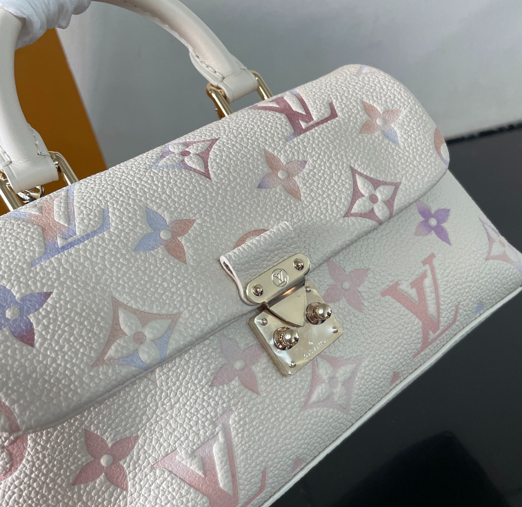 Exquisite Louis Vuitton Handbag With Colorful Monogram And Gold Accents For Trendsetters