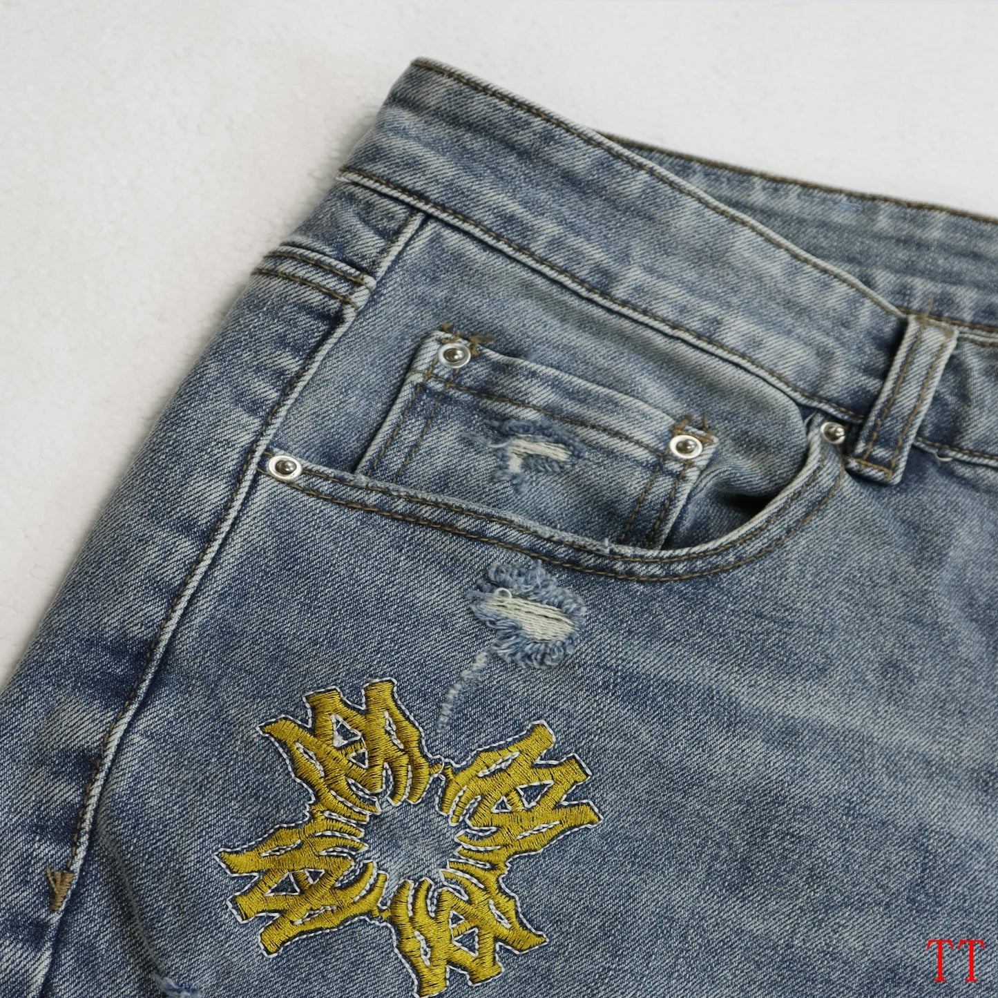 Amiri Light Blue Distressed Jeans With Colorful Embroidered Patterns