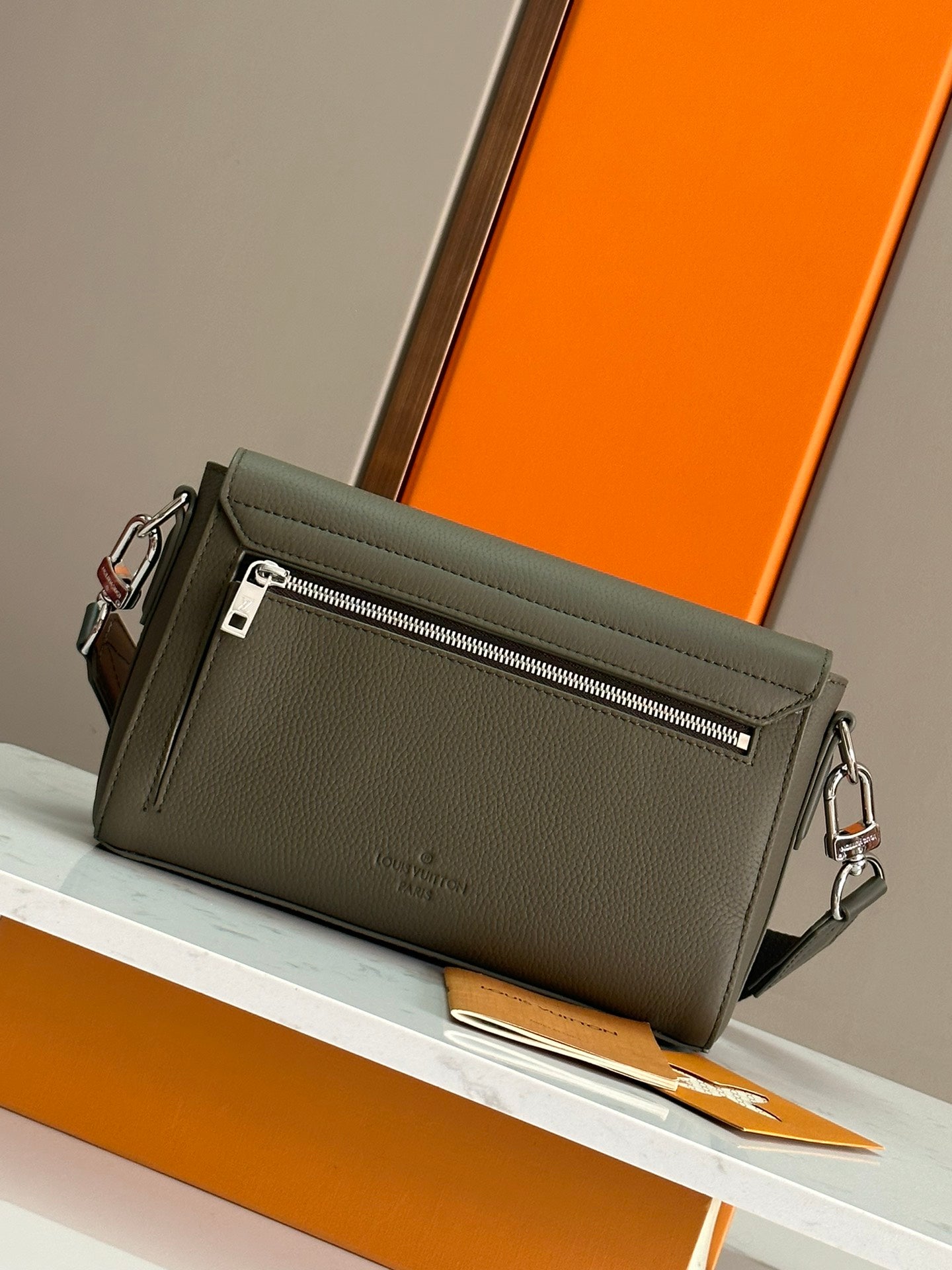 Elegant Louis Vuitton Gray Leather Crossbody Bag With Iconic LV Logo For Sophisticated Style M24769