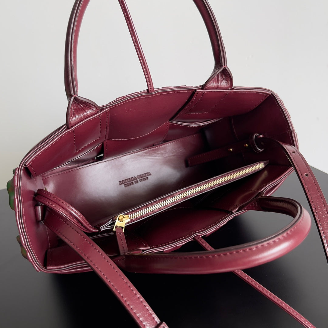 Bottega Veneta Burgundy Ruched Leather Tote Bag With Dual Handles And Adjustable Strap BV729042
